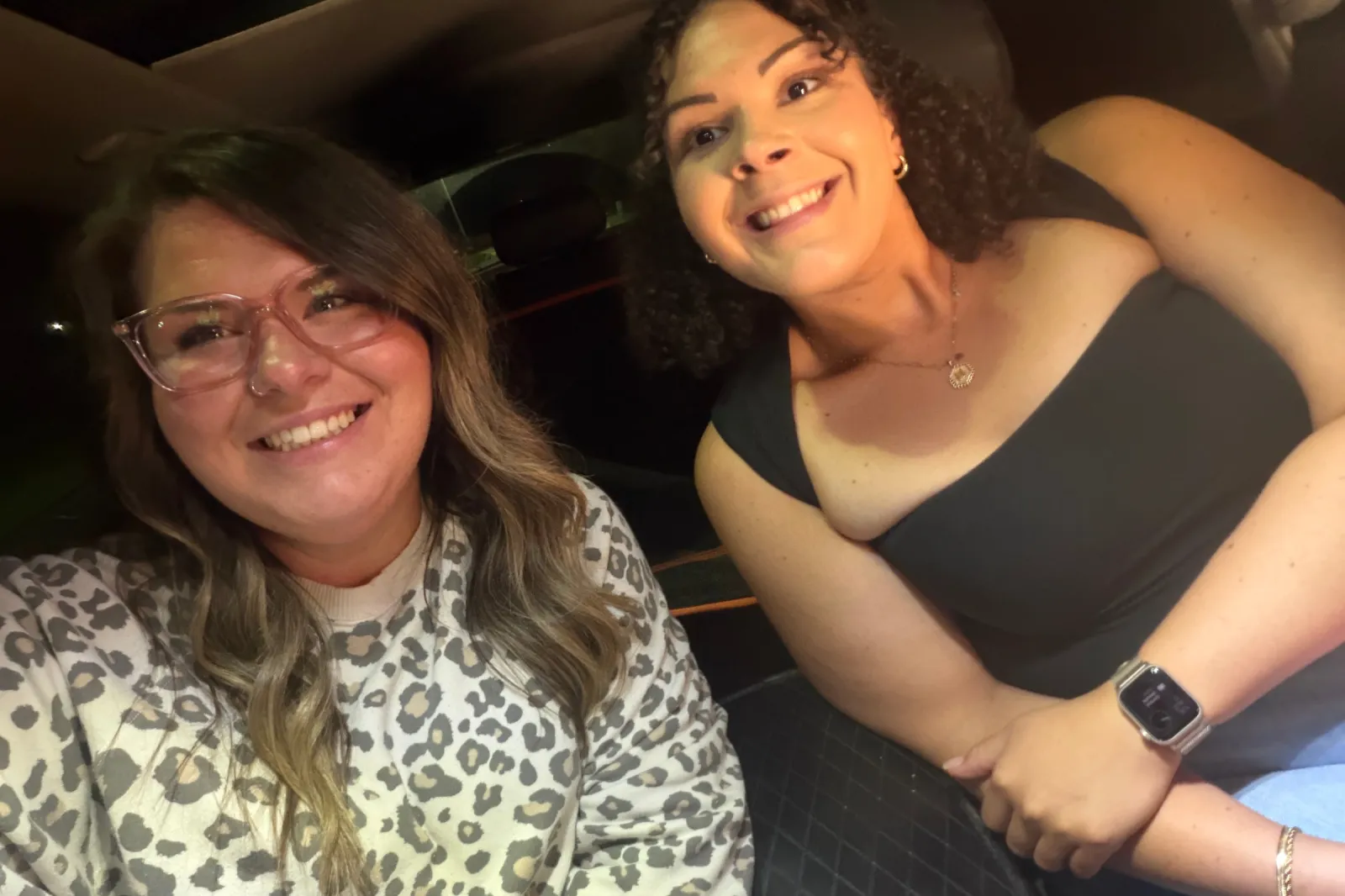 Jessica and Hayley smile in the car after the secret was revealed.