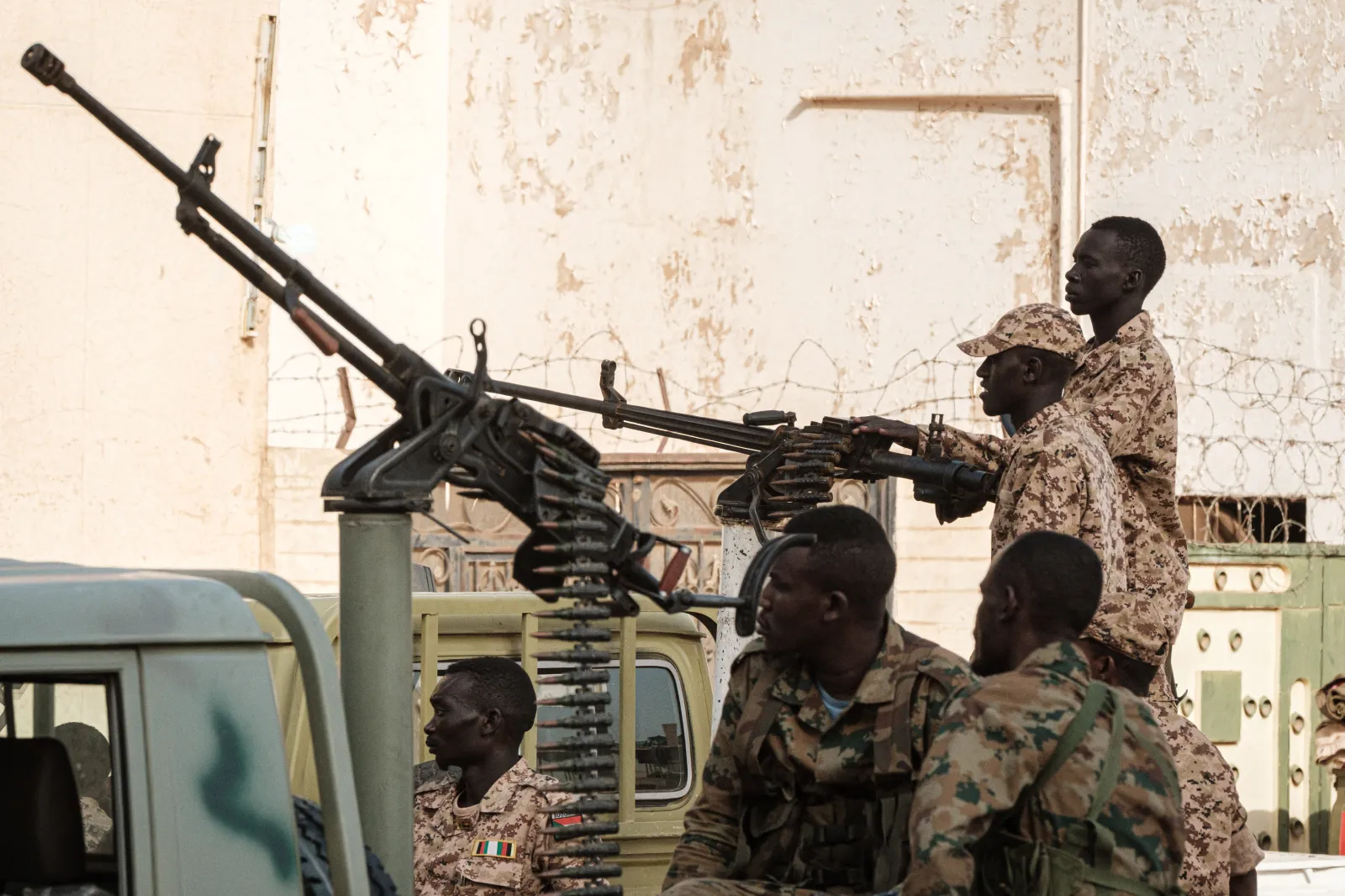 A member of Sudan's Rapid Support Forces (RSF) paramilitaries mans a machine gun turret while on guard outside the offices of the anti-corruption prosecution in the capital Khartoum on June 16, 2019.