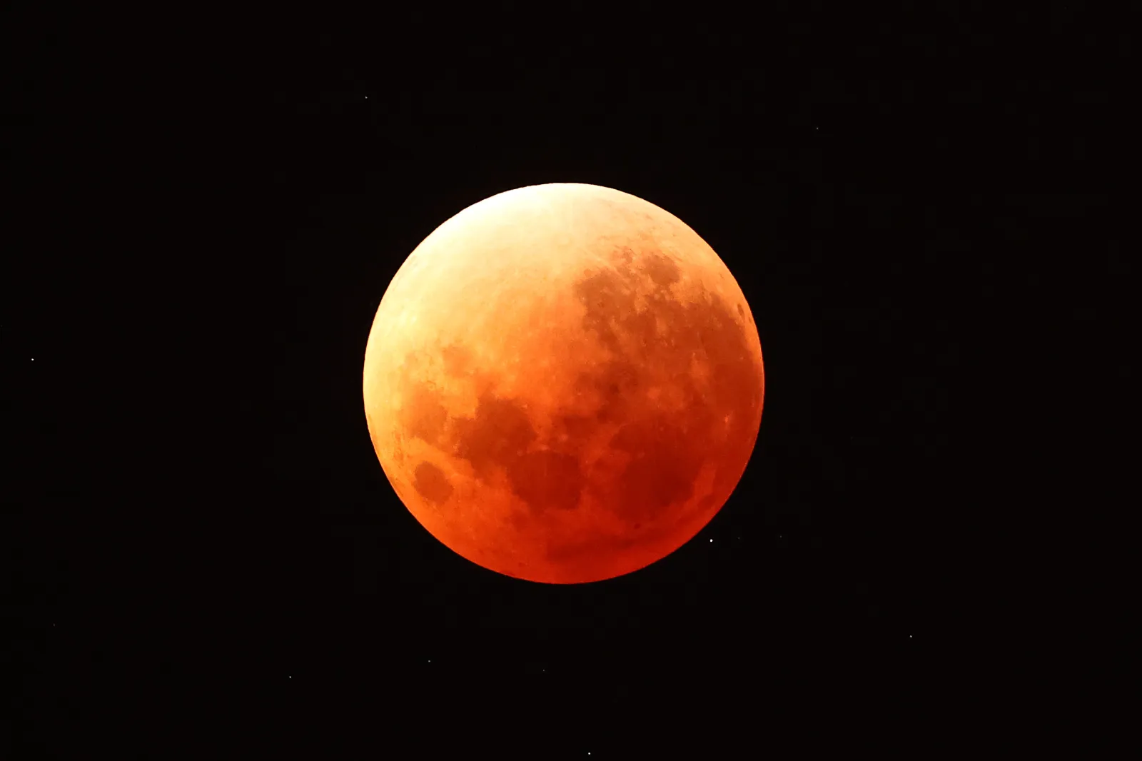 A lunar eclipse turns the moon red on March 3, 2026, in Auckland, New Zealand. A deep partial lunar eclipse will be visible across the U.S. on Thursday night.