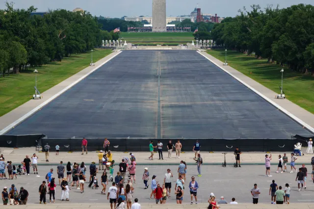Visitors walk between the Lincoln Memorial and the drained Lincoln Memorial Reflecting Pool on August 1, 2026 in Washington, DC.