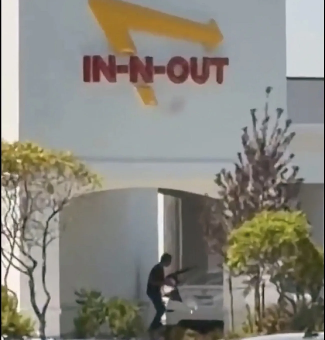 This still image from video captured by a witness shows the scene of a shooting that started at an In-N-Out Burger restaurant, Saturday, August 1, 2026 in Twin Falls, Idaho.