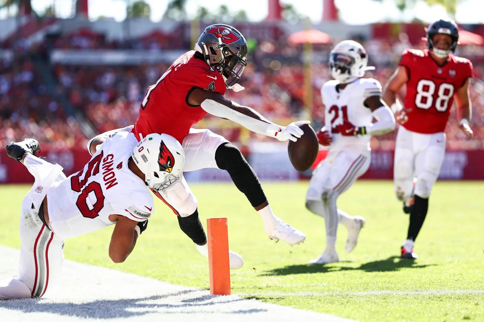 Rachaad White #1 of the Tampa Bay Buccaneers runs with the ball during the second quarter of an NFL football game against the Arizona Cardinals at Raymond James Stadium on November 30, 2025 in Tampa, Florida. (Photo by Kevin Sabitus/Getty Images)