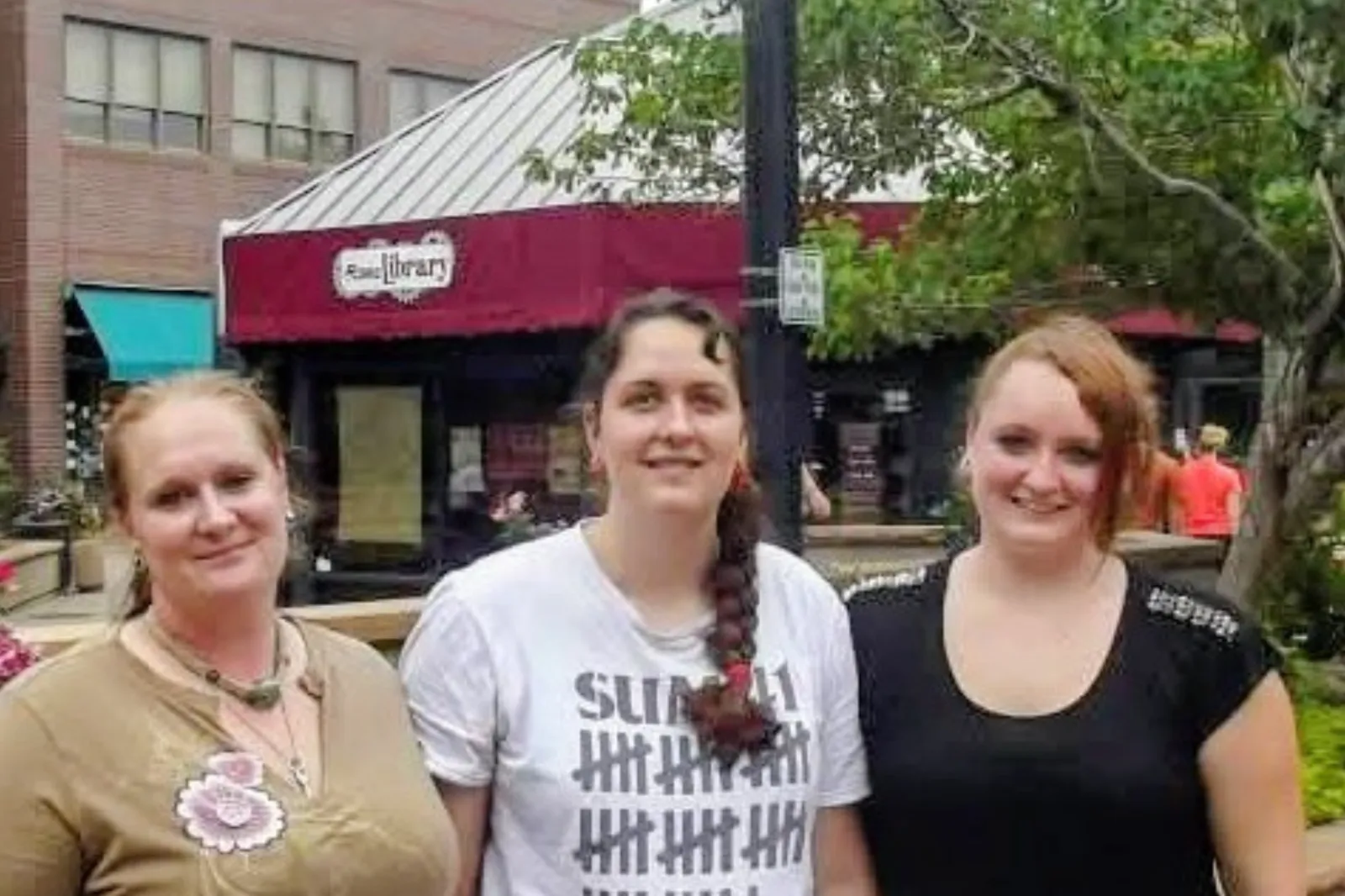 Anlia Bolinger-Rogers, left, Melissa, center, and her sister are pictured on the day they first met.