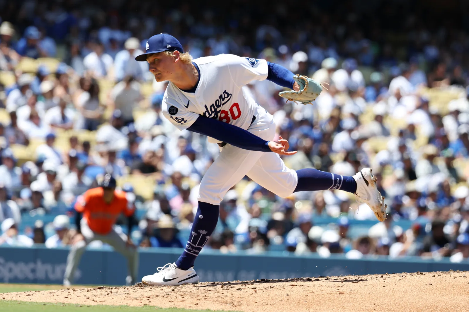 Emmett Sheehan #80 of the Los Angeles Dodgers pitches during the game against the Houston Astros at Dodger Stadium on July 06, 2025 in Los Angeles, California.
