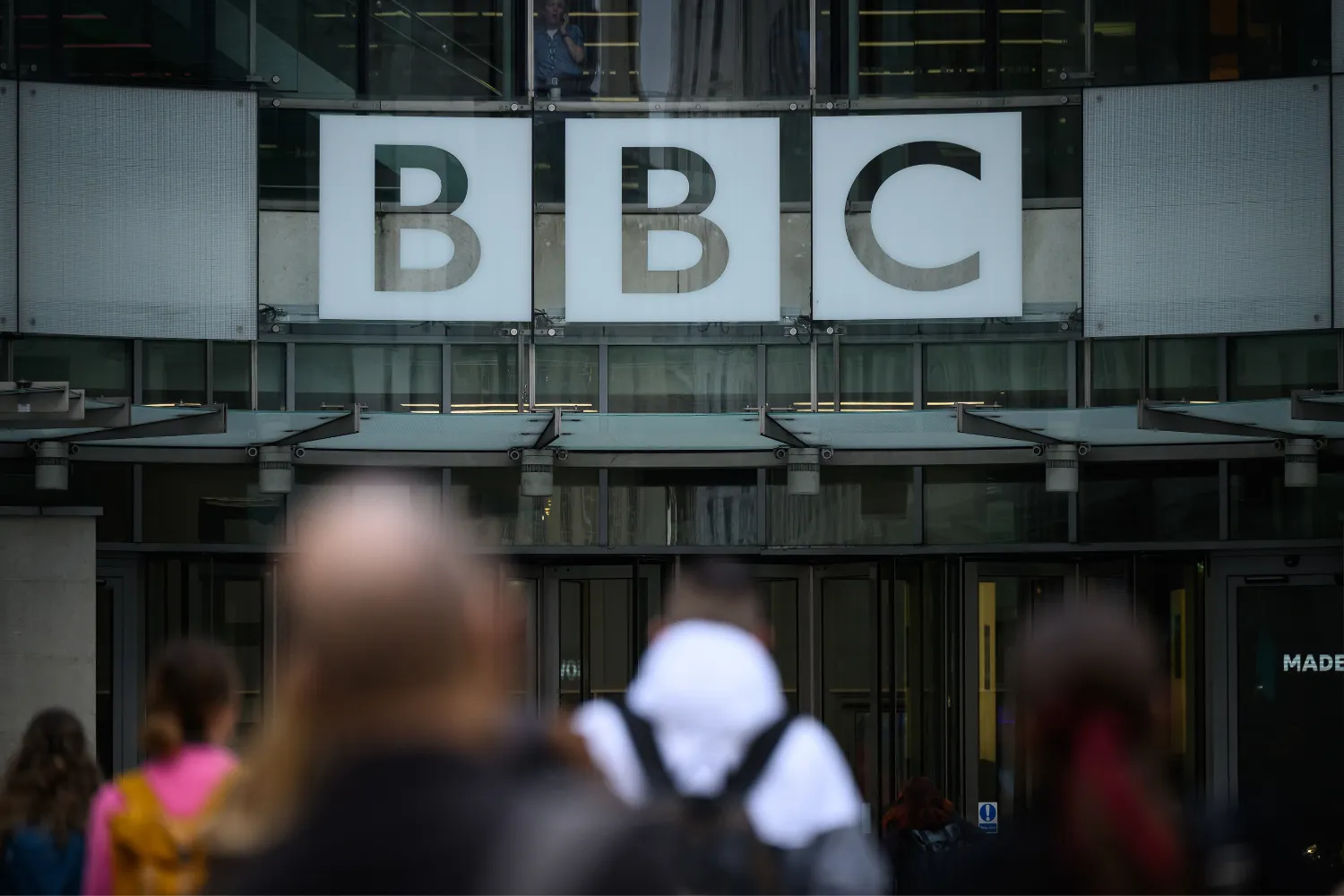 The BBC logo is displayed above the entrance to Broadcasting House on November 11, 2025 in London, England.
