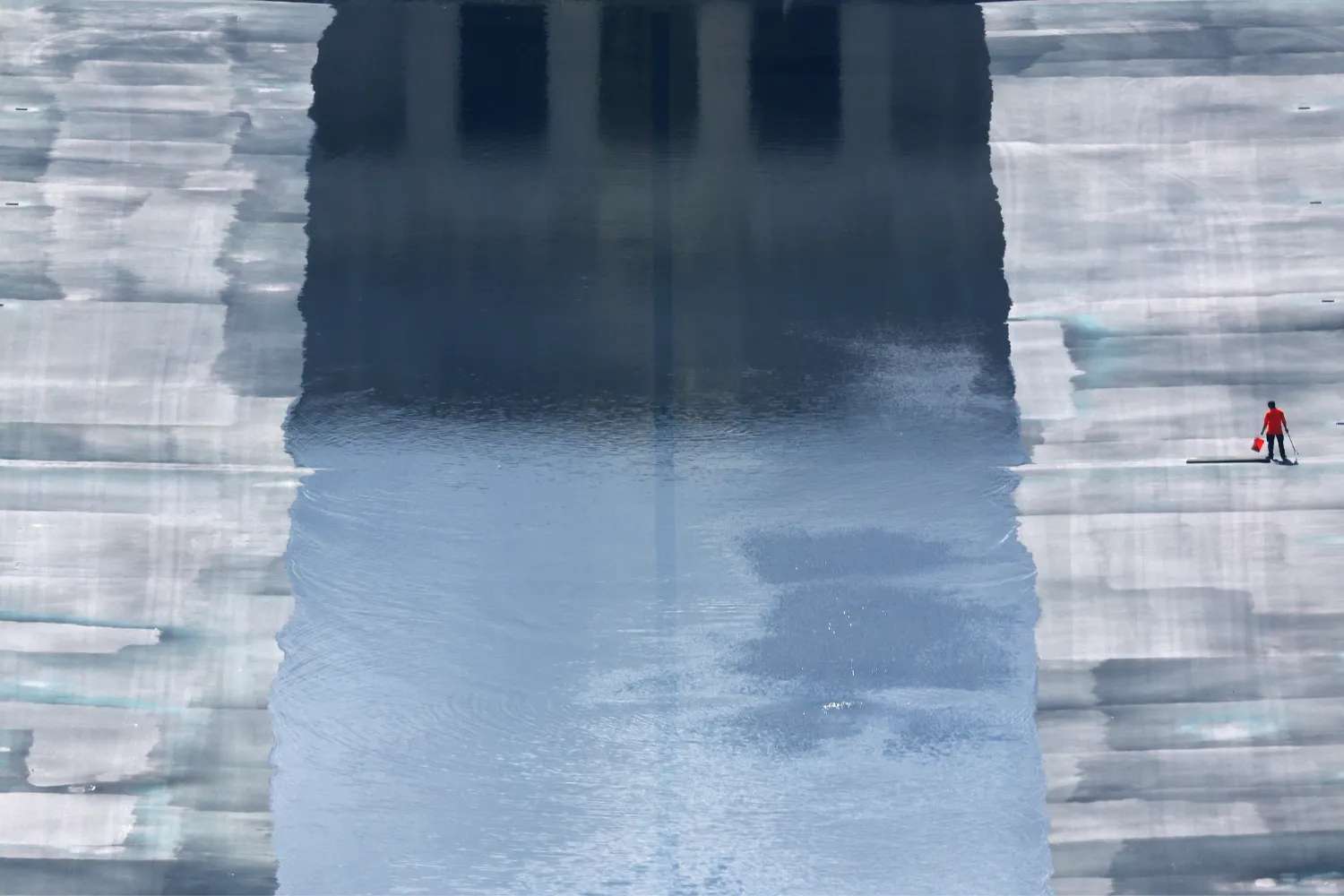 A lone worker tends the Lincoln Memorial Reflecting Pool shown partially filled on August 05, 2026 in Washington, DC.