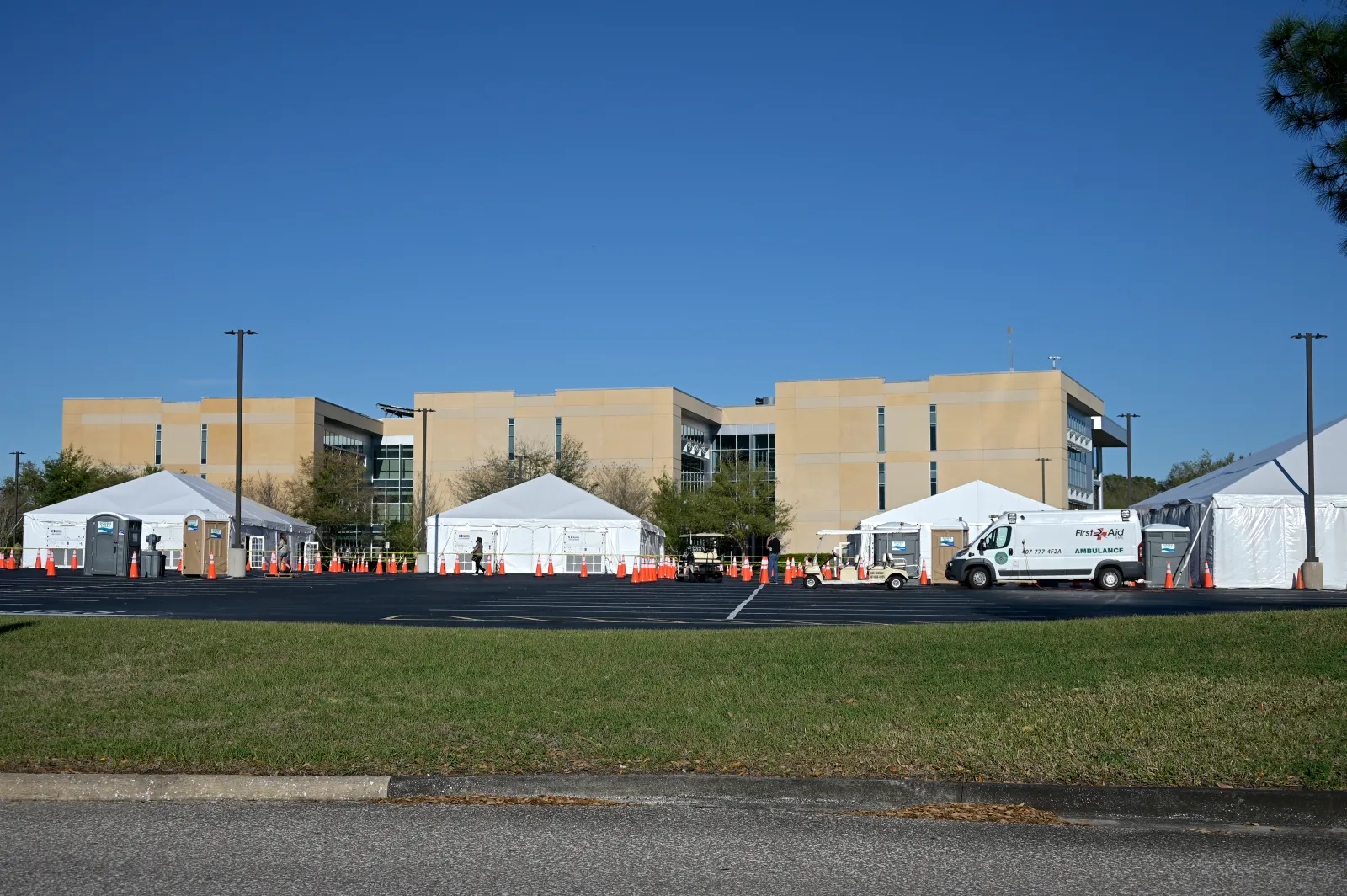 FEMA tents are viewed in a parking lot of Valencia College as the federal government administers COVID-19 vaccinations in them during a new coronavirus pandemic