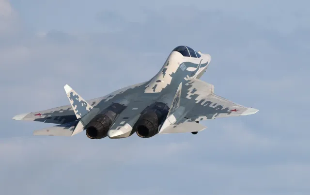 The new Russian Sukhoi Su-57D two-seater multirole fighter jet, equipped with the fifth-generation engine known as "Product 177," flies during its test flight in the Moscow region on May 19. This image was provided to AP by a third party and has not been independently verified.