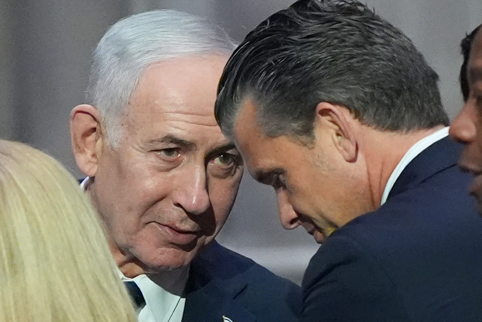 Israeli Prime Minister Benjamin Netanyahu, left, speaks to Secretary of Defense Pete Hegseth, right, before the funeral of Sen. Lindsey Graham, R-S.C., Tuesday,