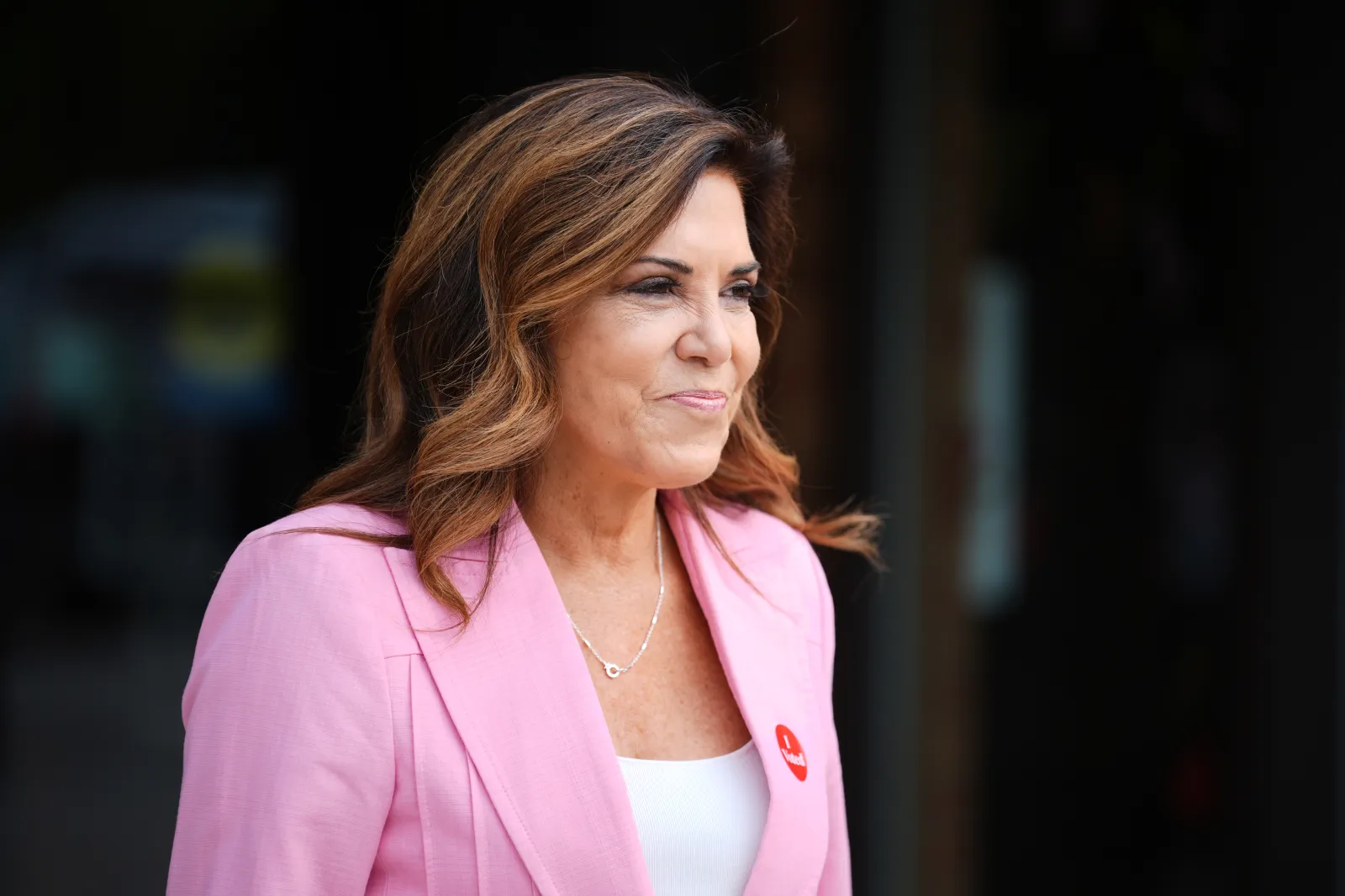 Michele Tafoya, a Republican candidate for U.S. Senate in Minnesota, leaves a polling site after voting on August 11, 2026, in Minneapolis. (AP Photo/Ellen Schm