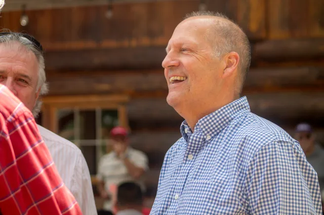 Former Senator John Sununu speaks with voters in Berlin, New Hampshire, on August 22, 2026.