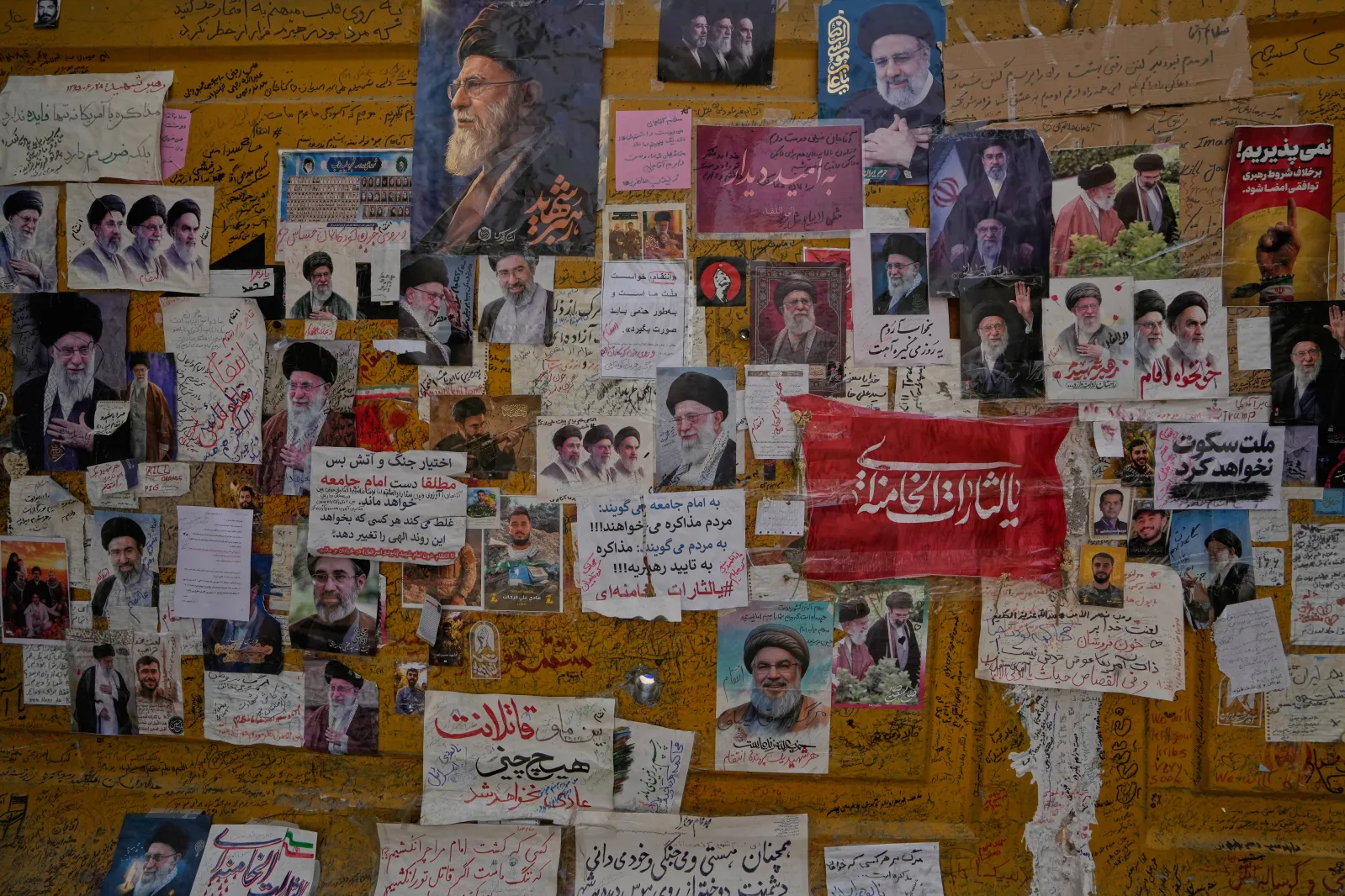 Tributes to and photos of late Iranian Supreme Leader Ayatollah Ali Khamenei, late President Ebrahim Raisi, late revolutionary founder Ayatollah Khomeini, Leban