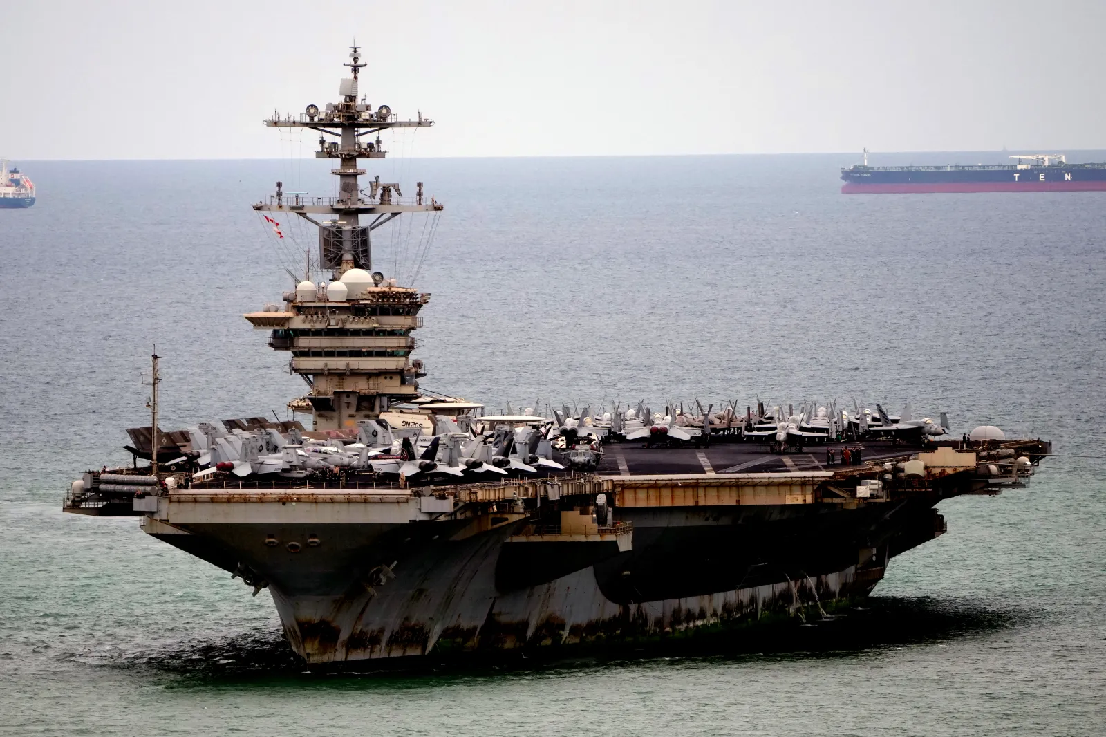 The U.S. Navy aircraft carrier USS Abraham Lincoln arrives at the port in Laem Chabang, Chonburi, Thailand, on September 2. | AP Photo/Sakchai Lalit