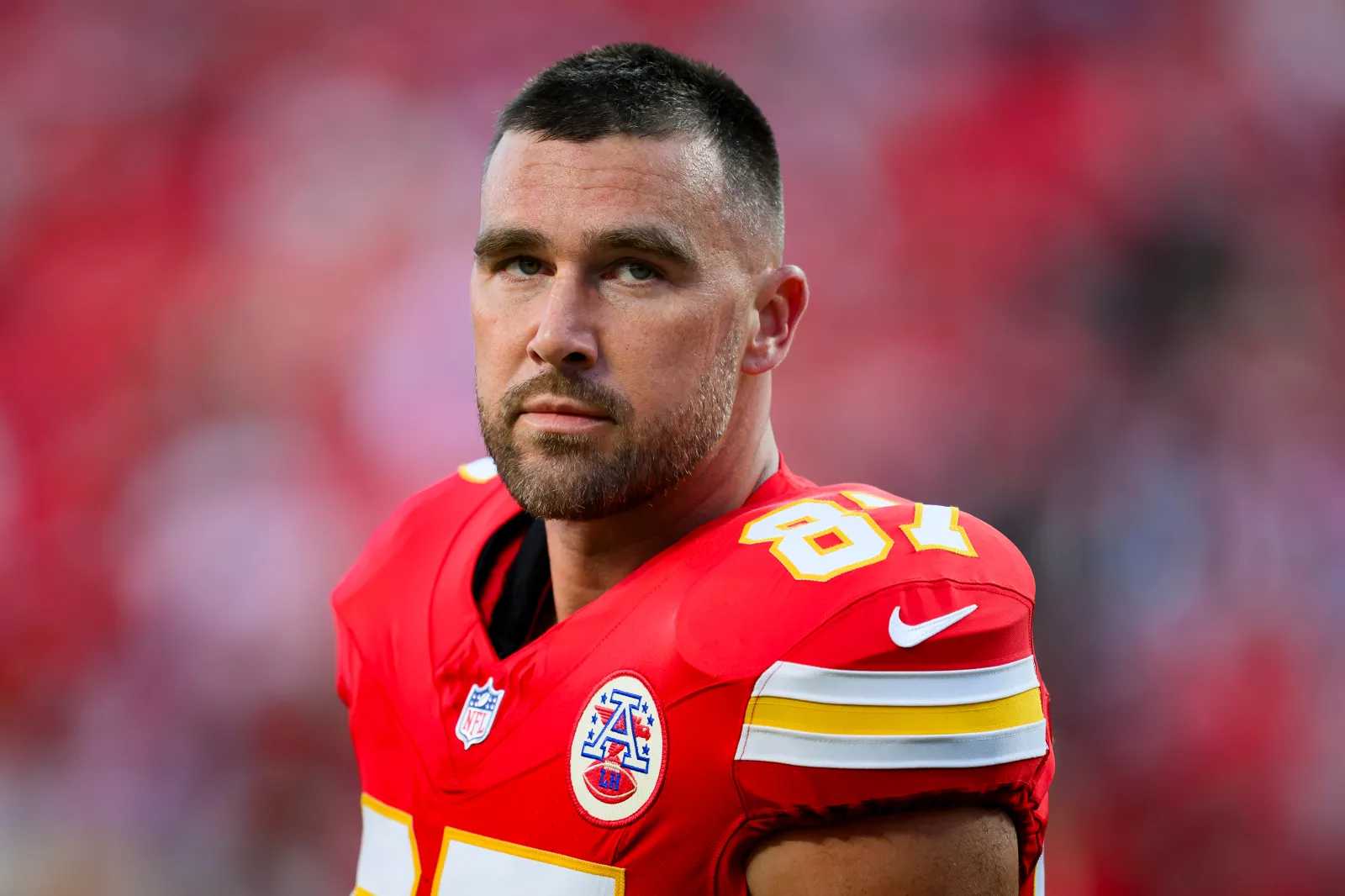 Kansas City Chiefs tight end Travis Kelce looks to the crowd during warmups before the first half of an NFL football game against the Denver Broncos in Kansas C