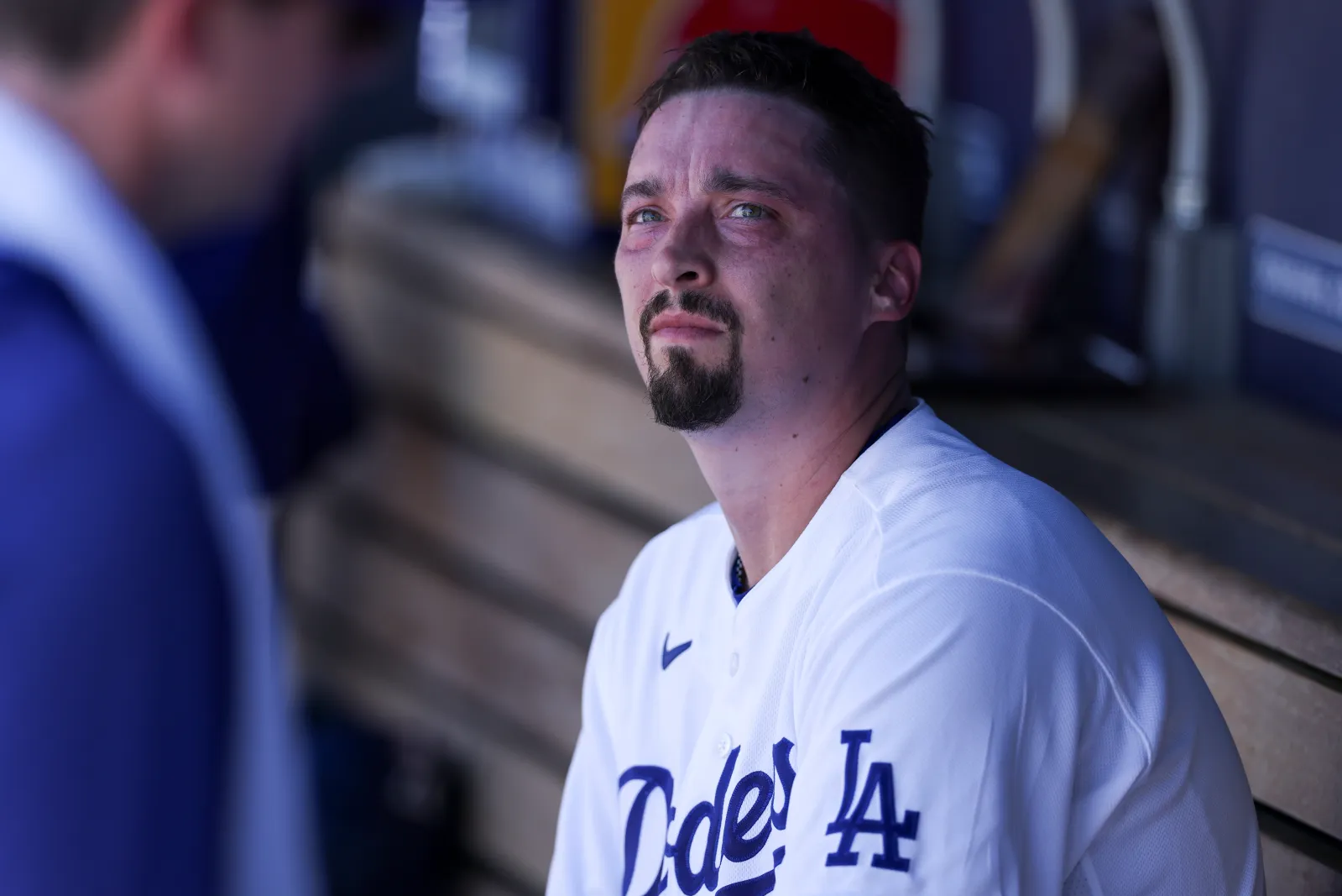 LOS ANGELES, CALIFORNIA - AUGUST 23: Blake Snell #7 of the Los Angeles Dodgers looks on from the dugout during the fourth inning against the Pittsburgh Pirates