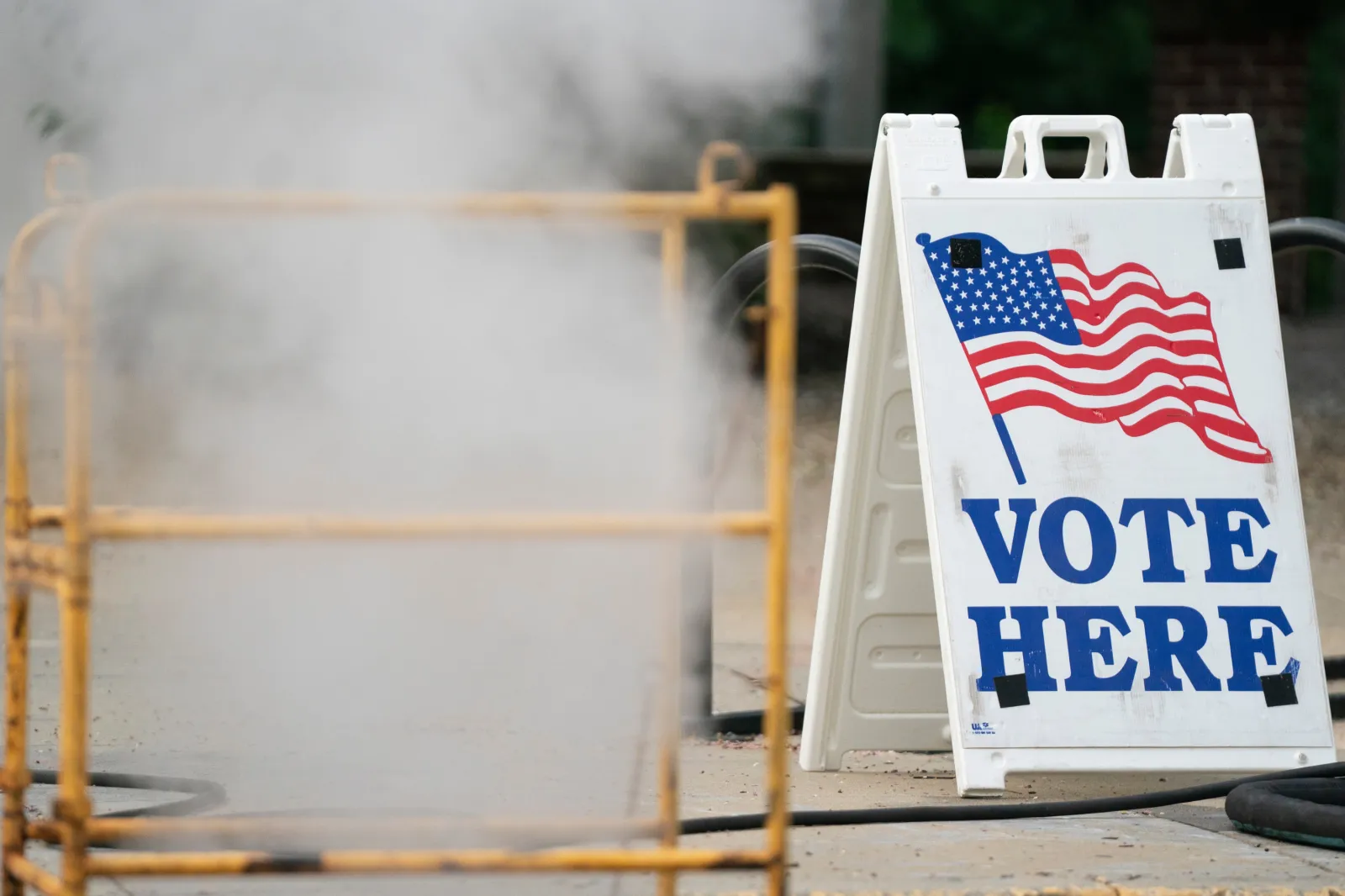 Steam rises near a sign before polls open for early voting at the Solomon Blatt PE Center on May 26, 2026 in Columbia, South Carolina.