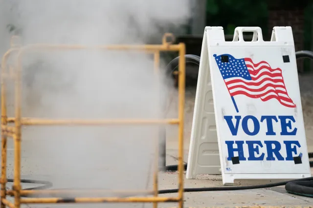 Steam rises near a sign before polls open for early voting at the Solomon Blatt PE Center on May 26, 2026 in Columbia, South Carolina.