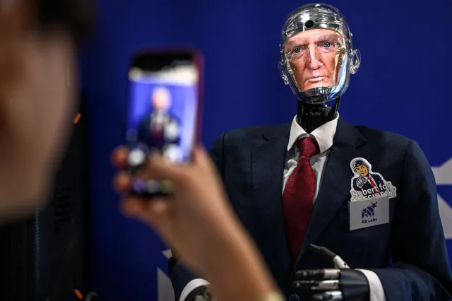 The face of US President Donald Trump displayed on Robert the Robot, an advanced conversational humanoid developed by Geneva-based technology company RB Labs, during the AI for Good Global Summit, a United Nations flagship event aimed at shaping the future of artificial intelligence, in Geneva on July 7, 2026.