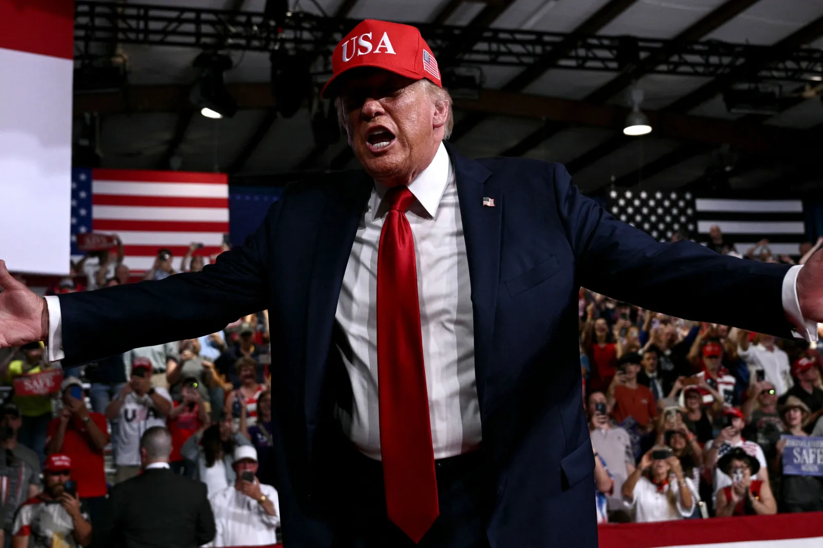 Donald Trump arrives to speak at a rally at Gastonia Municipal Airport in Gastonia, North Carolina, on September 16, 2026. Trump is campaigning for Republican U
