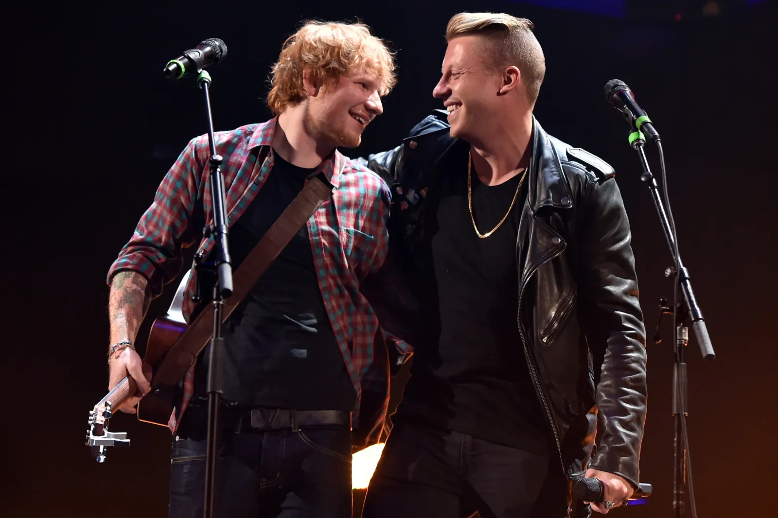 Ed Sheeran (L) and Macklemore (R) perform onstage during the 2014 iHeartRadio Music Festival at the MGM Grand Garden Arena on September 20, 2014 in Las Vegas, Nevada.