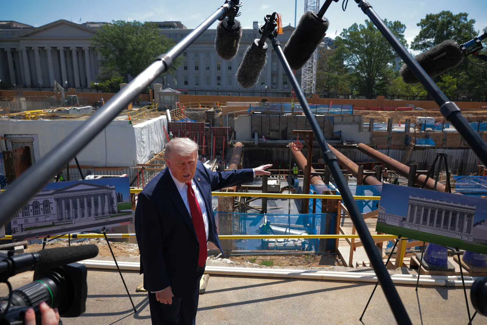 President Donald Trump speaking next to the ballroom construction site in Washington, D.C., in May.
