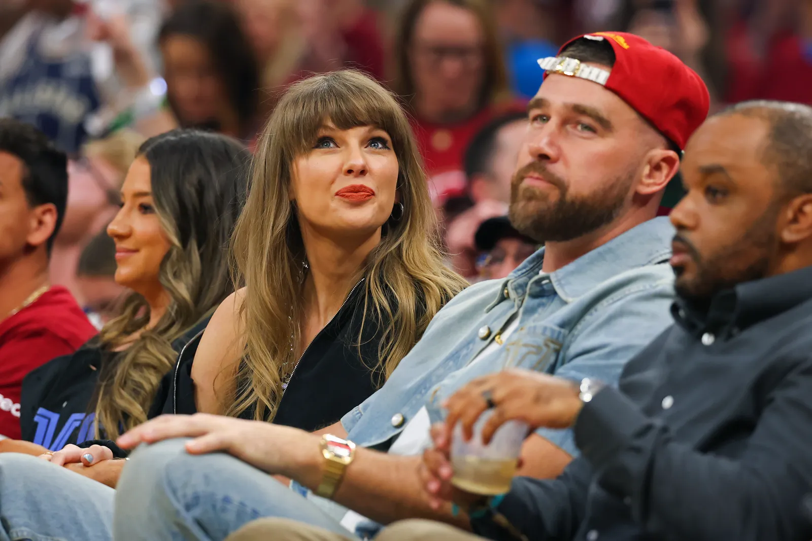 Taylor Swift and Travis Kelce of the Kansas City Chiefs attend Game Three between the New York Knicks and the Cleveland Cavaliers in the NBA Eastern Conference Finals at Rocket Arena on May 23, 2026 in Cleveland, Ohio.