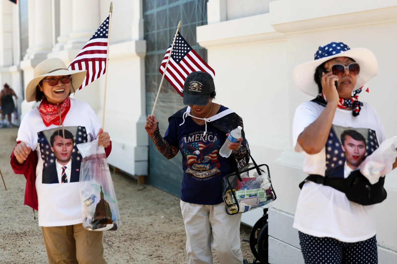 People in Charlie Kirk shirts visit the Great American State Fair for the Fourth of July, the National Mall, Washington, D.C, July 4, 2026.