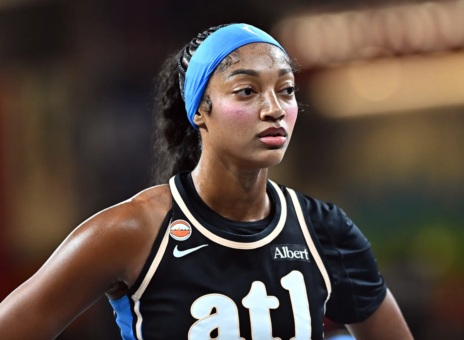 Atlanta Dream star Angel Reese looks on during WNBA game against Portland Fire