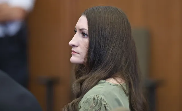 Lindsay Clancy looks on as jurors (out of frame) enter the courtroom during Clancy's murder trial at the Plymouth County Superior Court in Plymouth, Massachusetts, on September 4.
