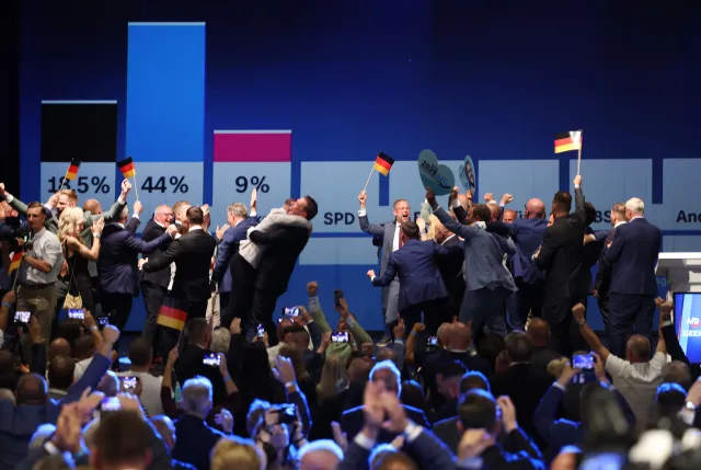 Supporters of the far-right Alternative for Germany (AfD) cheer at the AfD election evening watch party on September 6, 2026 in Magdeburg, Germany.