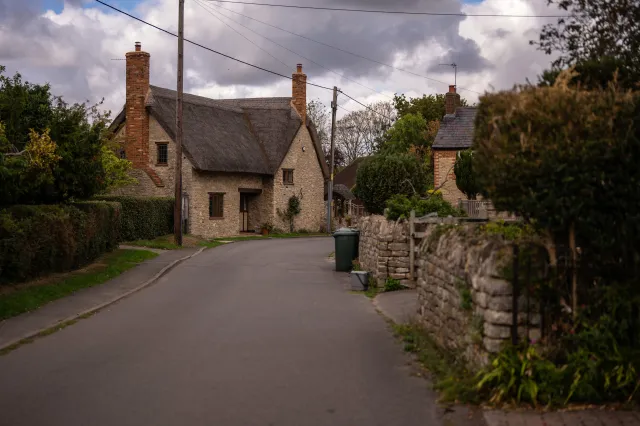 PIDDINGTON, ENGLAND - SEPTEMBER 16: A road leads through the village of Piddington on September 16, 2026 in Piddington, United Kingdom. Yesterday Piddington in Oxfordshire held a symbolic referendum seeking Independence from the UK over the government's plans to house up to 1,256 male asylum seekers at nearby former military base, MoD Bicester without public consultation.