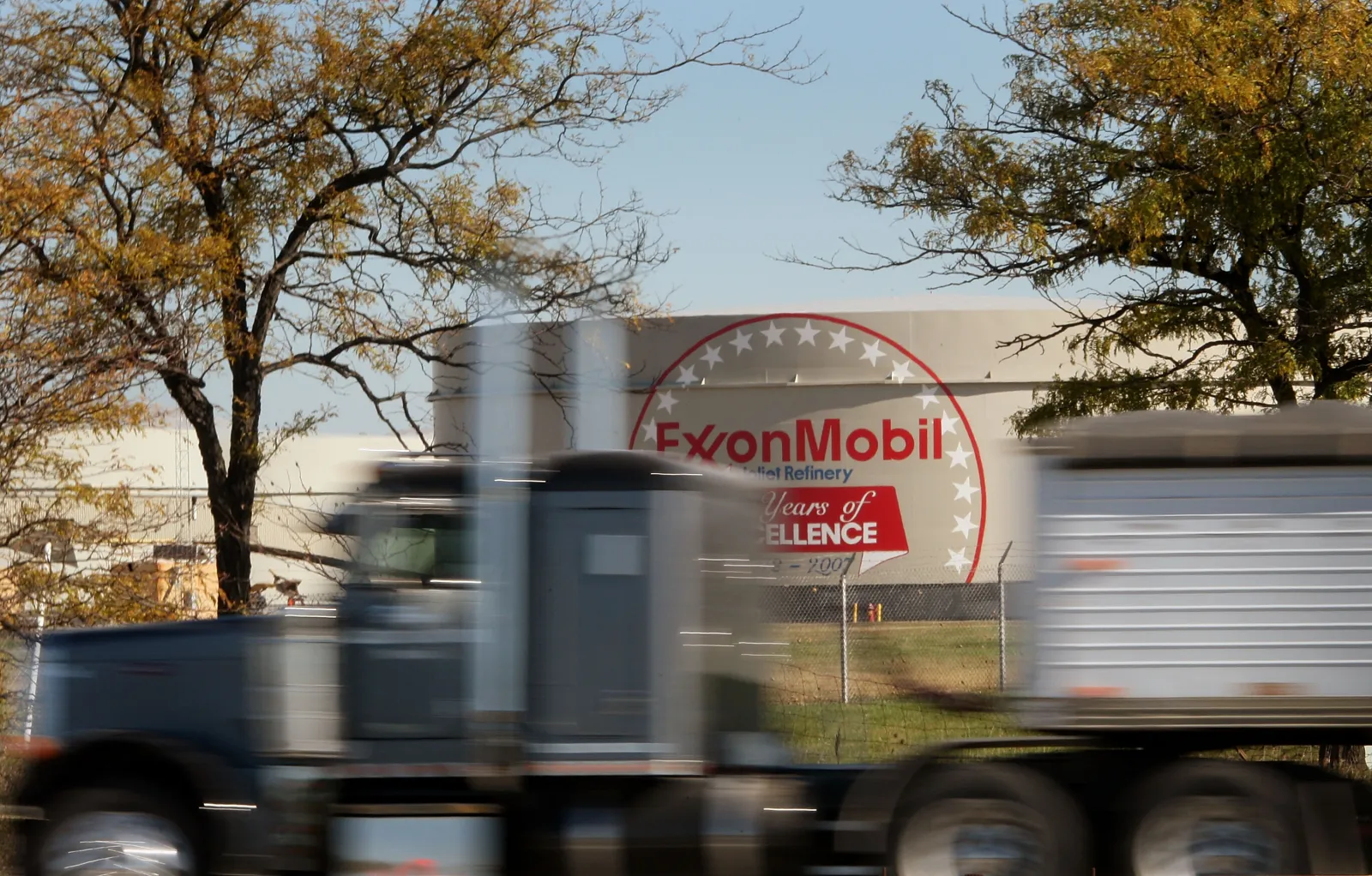 A truck passes by the Exxon Mobil refinery November 1, 2007 in Joliet, Illinois.