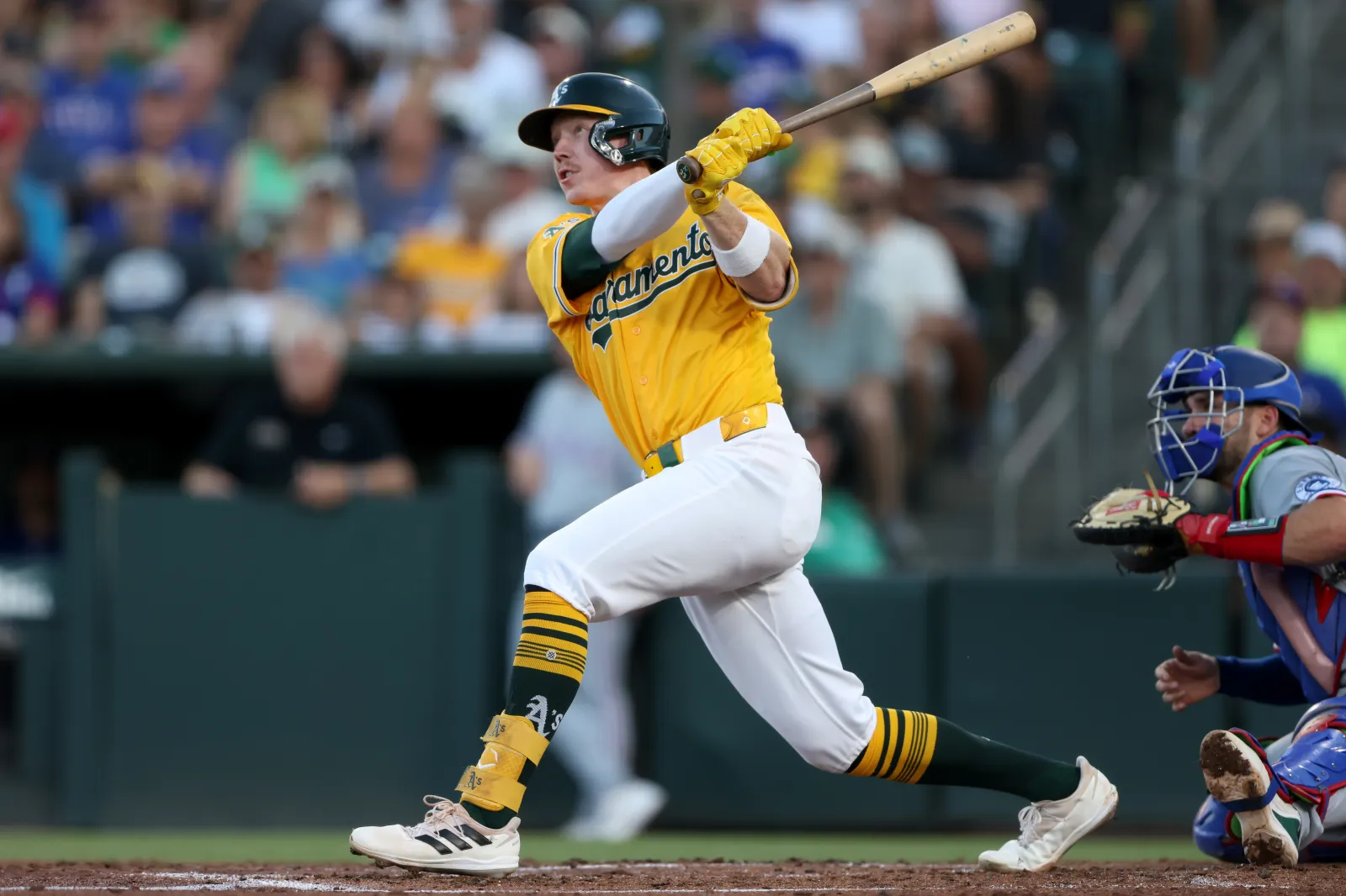 SACRAMENTO, CALIFORNIA - AUGUST 15: Henry Bolte #33 of the Athletics hits a three-run home run during the bottom of the second inning against the Texas Rangers 