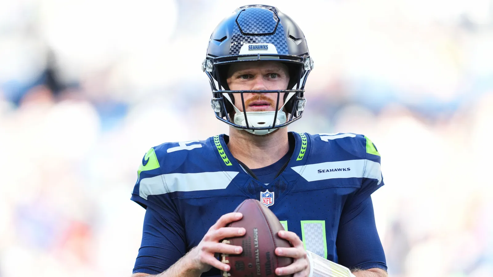 SEATTLE, WA - SEPTEMBER 09: Sam Darnold #14 of the Seattle Seahawks warms up prior to an NFL football game against the New England Patriots at Lumen Field on Se