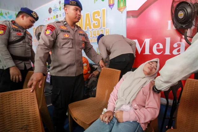 On September 13, 2026, a woman reacts upon learning that her relative is among the survivors of the Virgo Transport 8, after the passenger vessel lost contact due to bad weather.