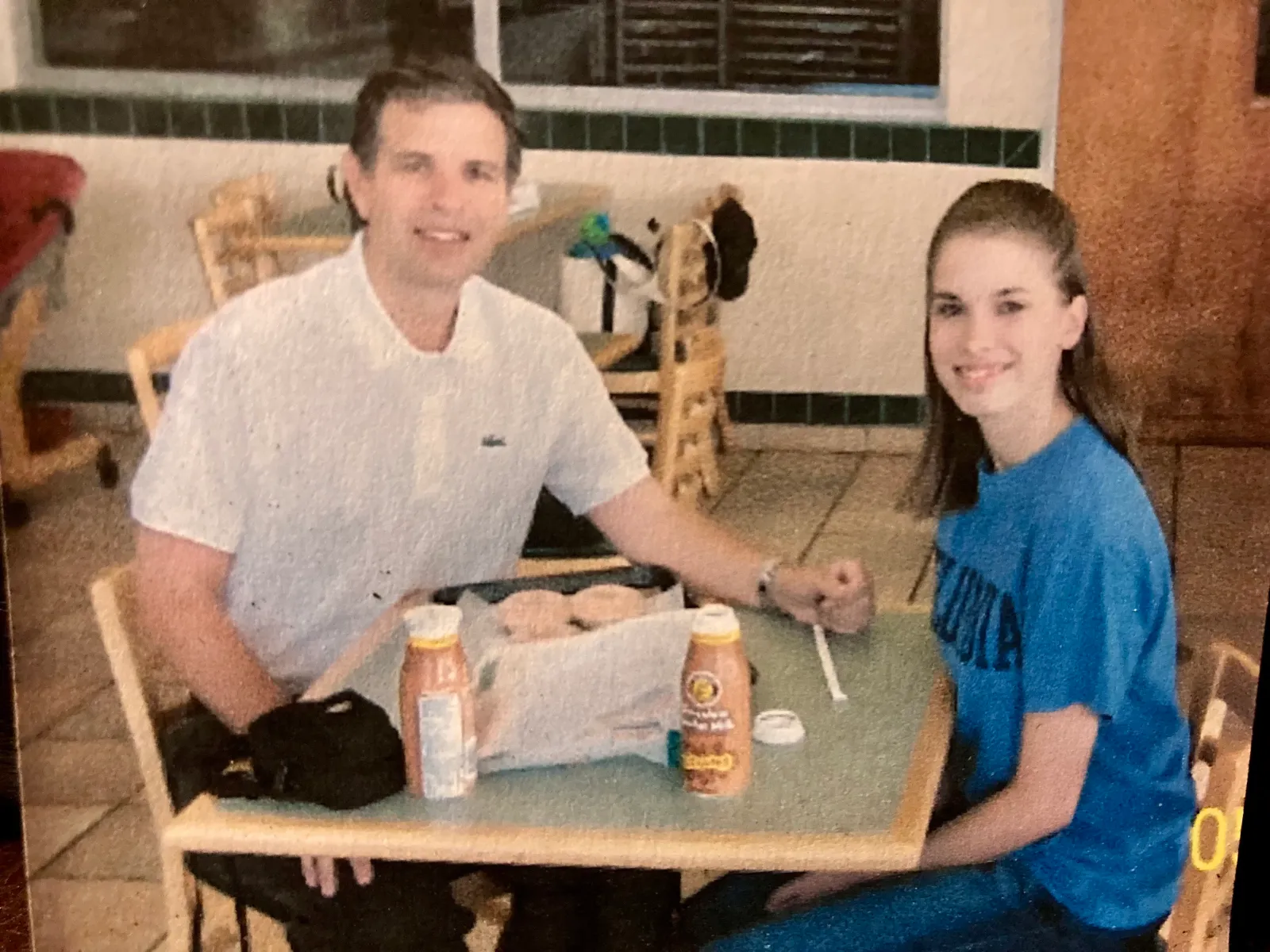 Coble with her dad when she was younger, during one of their visits to Krispy Kreme.