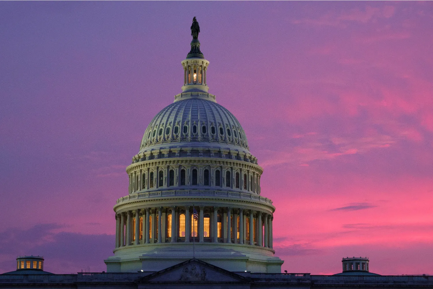 The sun sets behind the U.S. Capitol on a hot and humid evening on August 4, 2026 in Washington, D.C.