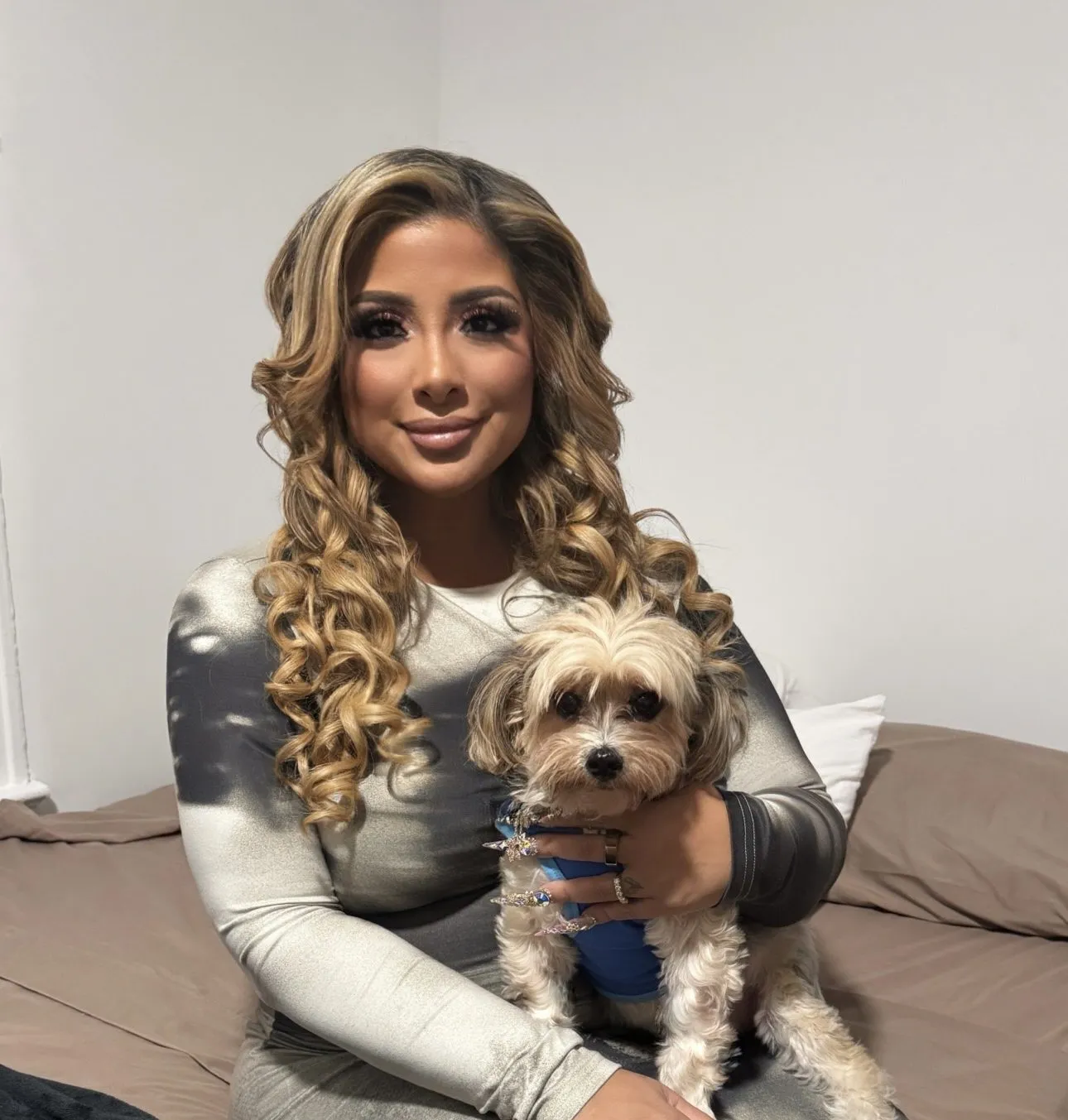 Ariella Iorio with Ciuppi, her "soul dog" who died of cancer. Ciuppi's fur got lighter as he got older, Iorio said, adding that the same has begun to happen with Smoochie.