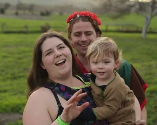 Rhoam Summer with his parents in a photo from January 2023.