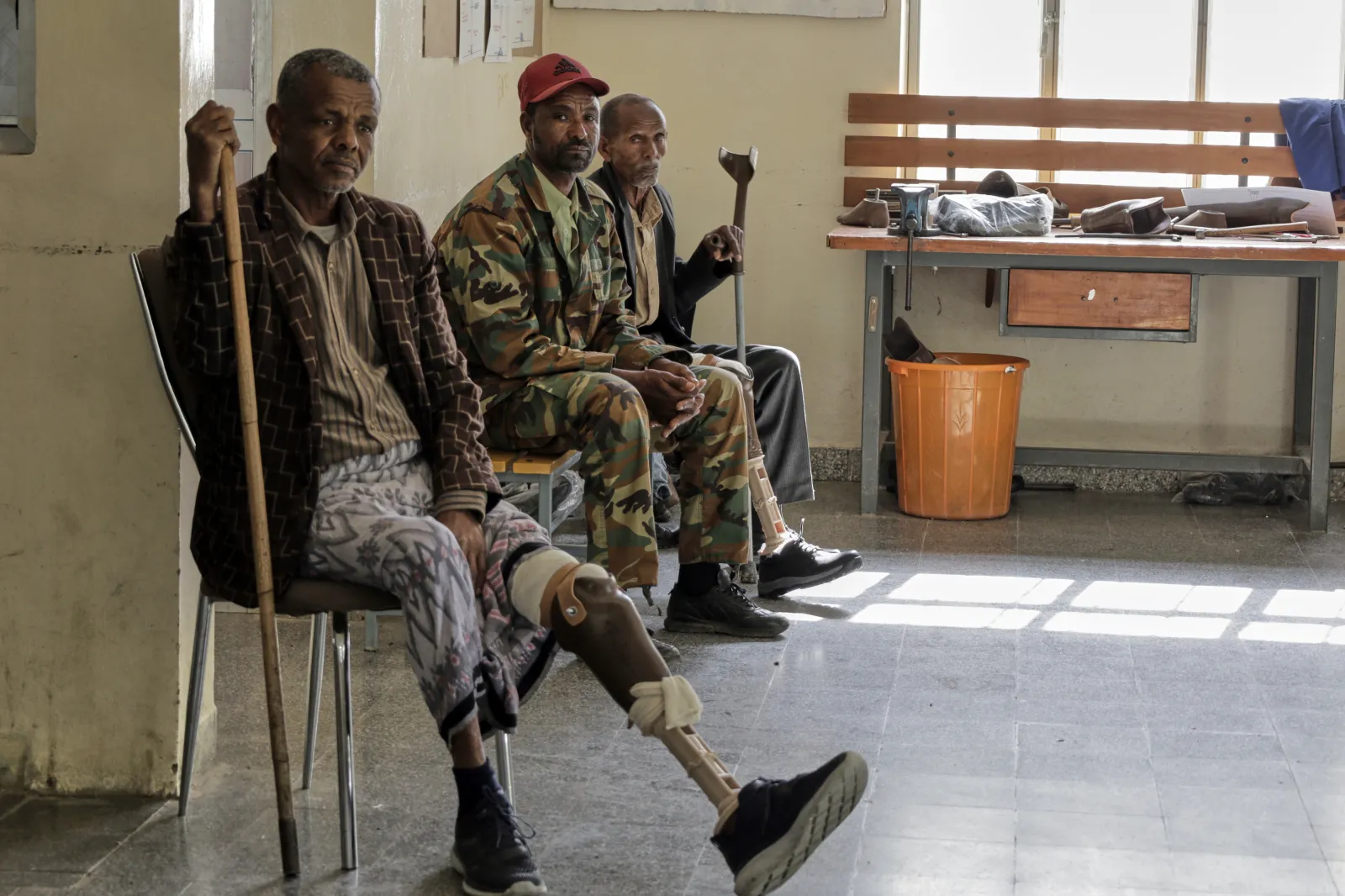 Wounded Tigrayan former combatants of the recent war, wait to be attended at Ortho-Physiotherapy Centre at Mekele in Tigray region of northern Ethiopia Friday, Feb. 14, 2025. (AP Photo/Amanuel Birhane)