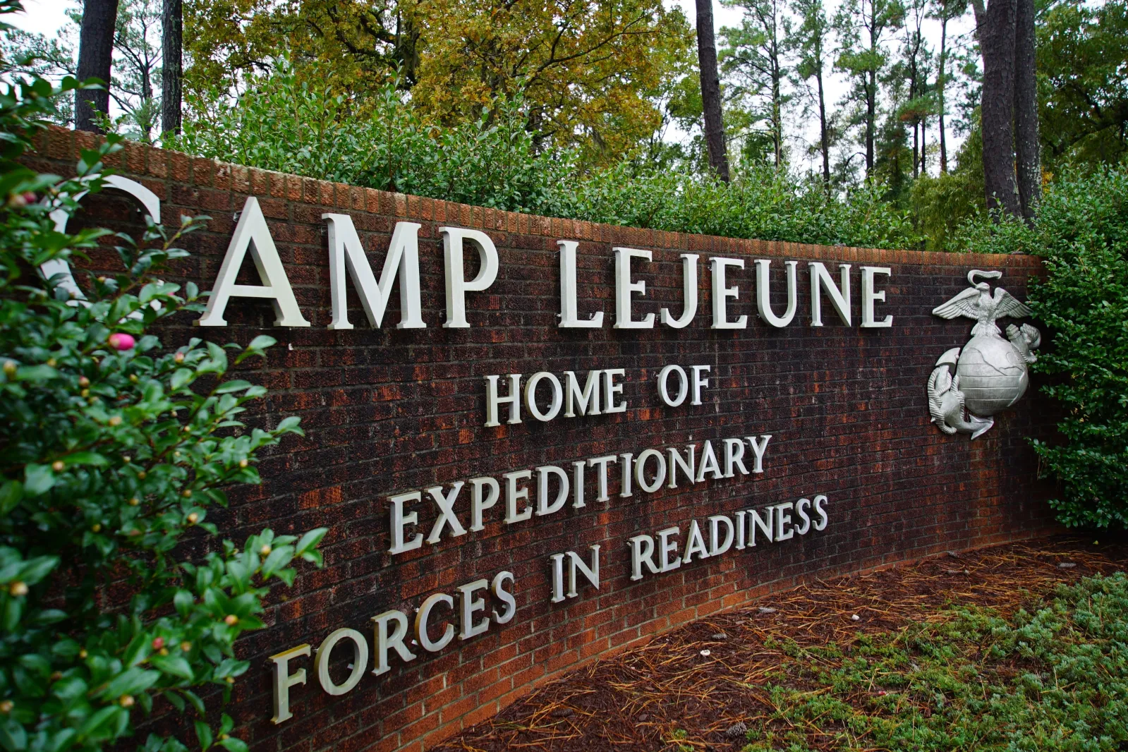 An ornamental sign with the Marine Corps emblem greets visitors to Camp Lejeune, N.C., on Thursday, Oct. 30, 2025.