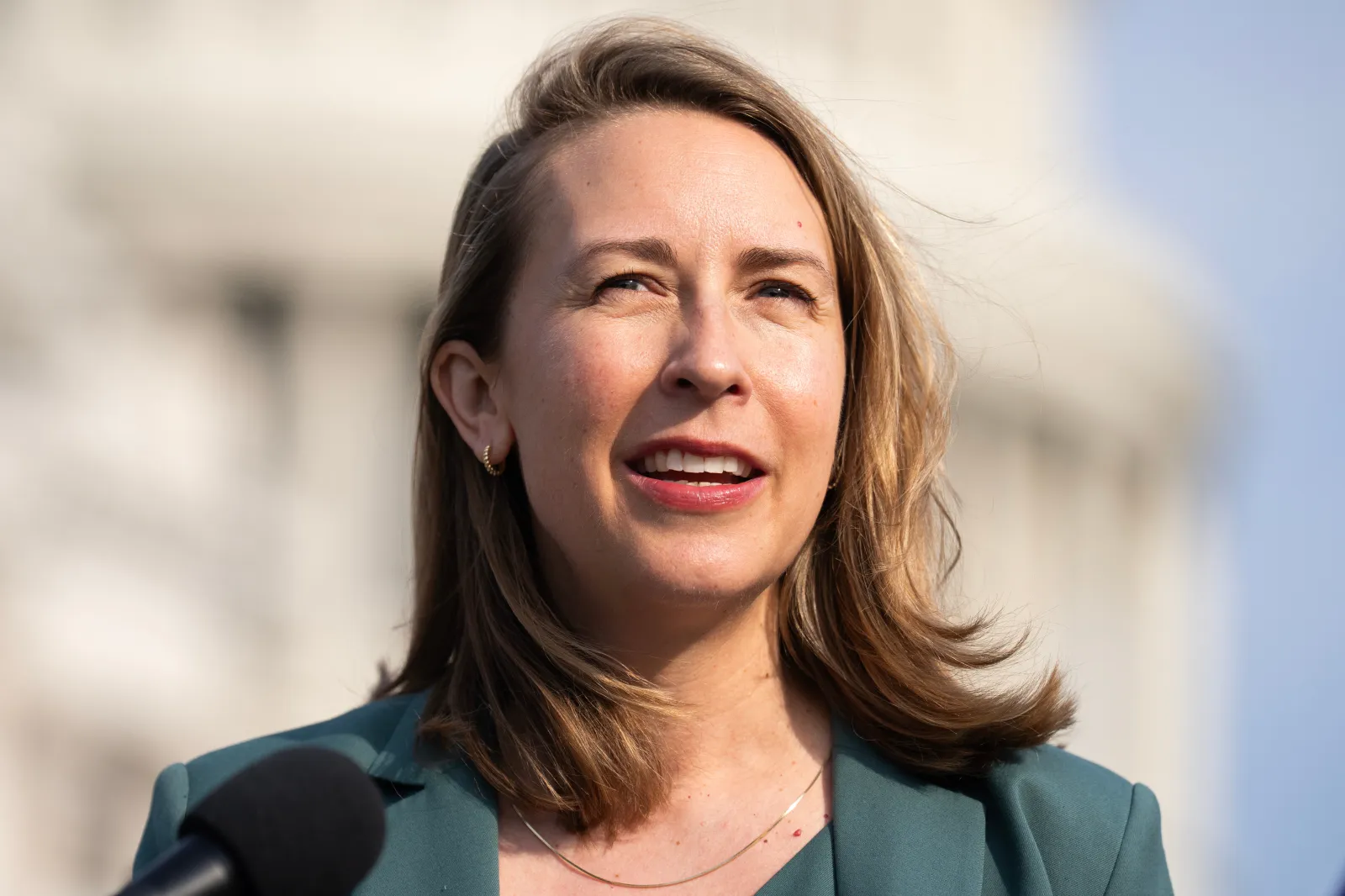 Representative Hillary Scholten, a Michigan Democrat, speaks during a news conference outside the U.S. Capitol with the Democratic Women's Caucus on Equal Pay Day to call for "equal pay for equal work," on March 26. (Tom Williams/CQ Roll Call via AP Images)