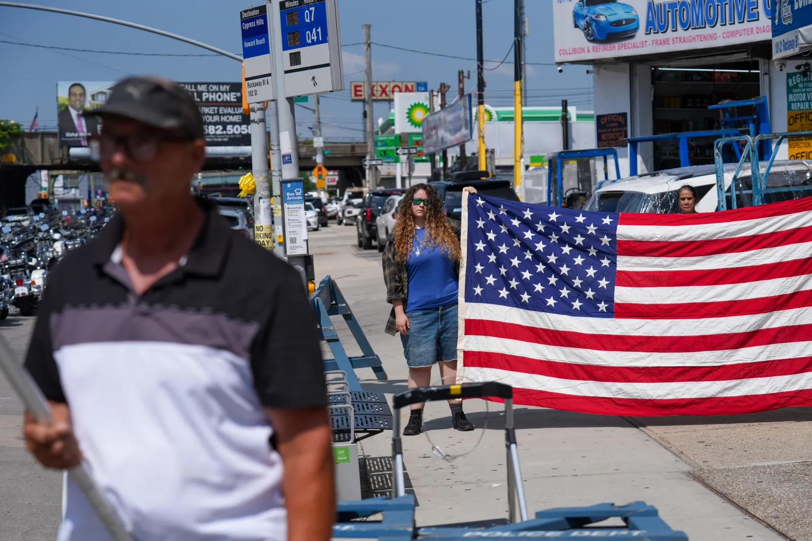File photo: people look on as a hearse carrying U.S. Army Sergeant Angel Sarah Rampersad, Queens borough, New York, July 31, 2026.