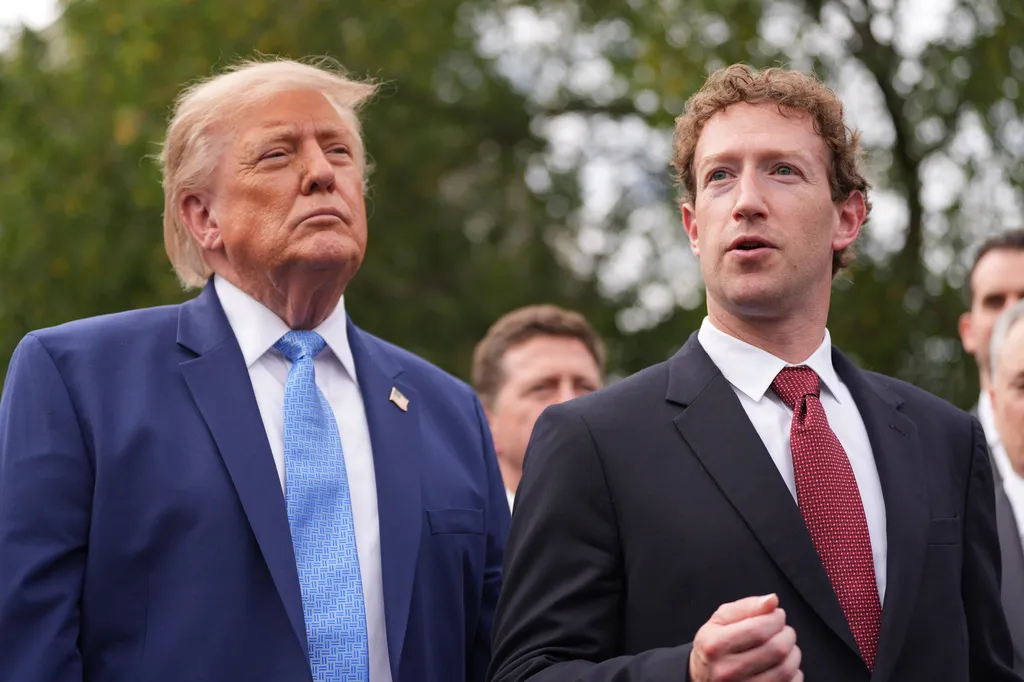 President Donald Trump listens as Meta CEO Mark Zuckerberg speaks to reporters at the White House in Washington, D.C., on September 29 after meeting with top executives of AI firms. (AP Photo/Alex Brandon)