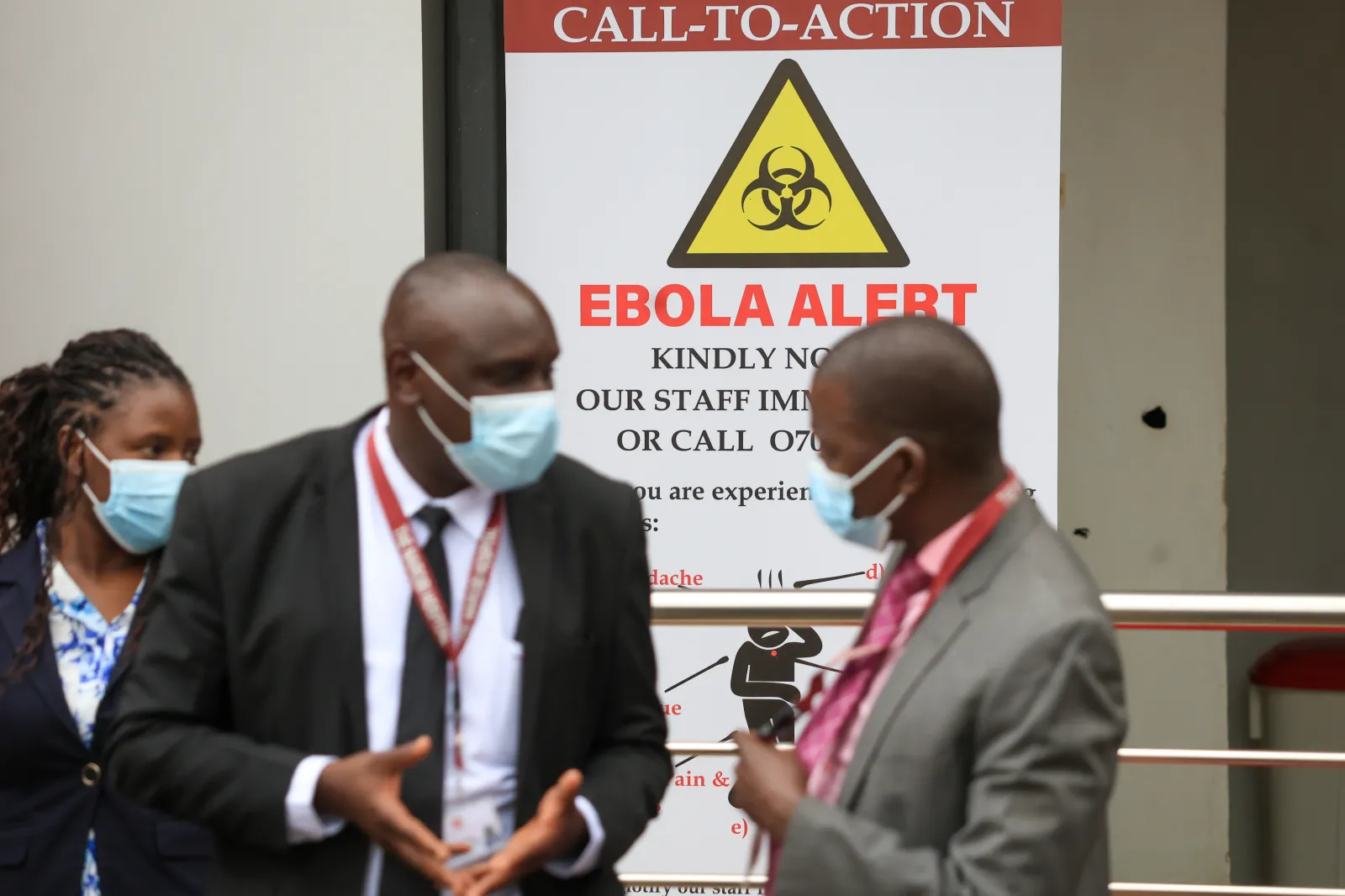Health workers and officials stand outside an Ebola isolation facility at The Nairobi Hospital, Kenya, Wednesday, Oct. 7, 2026. (| AP Photo/Andrew Kasuku