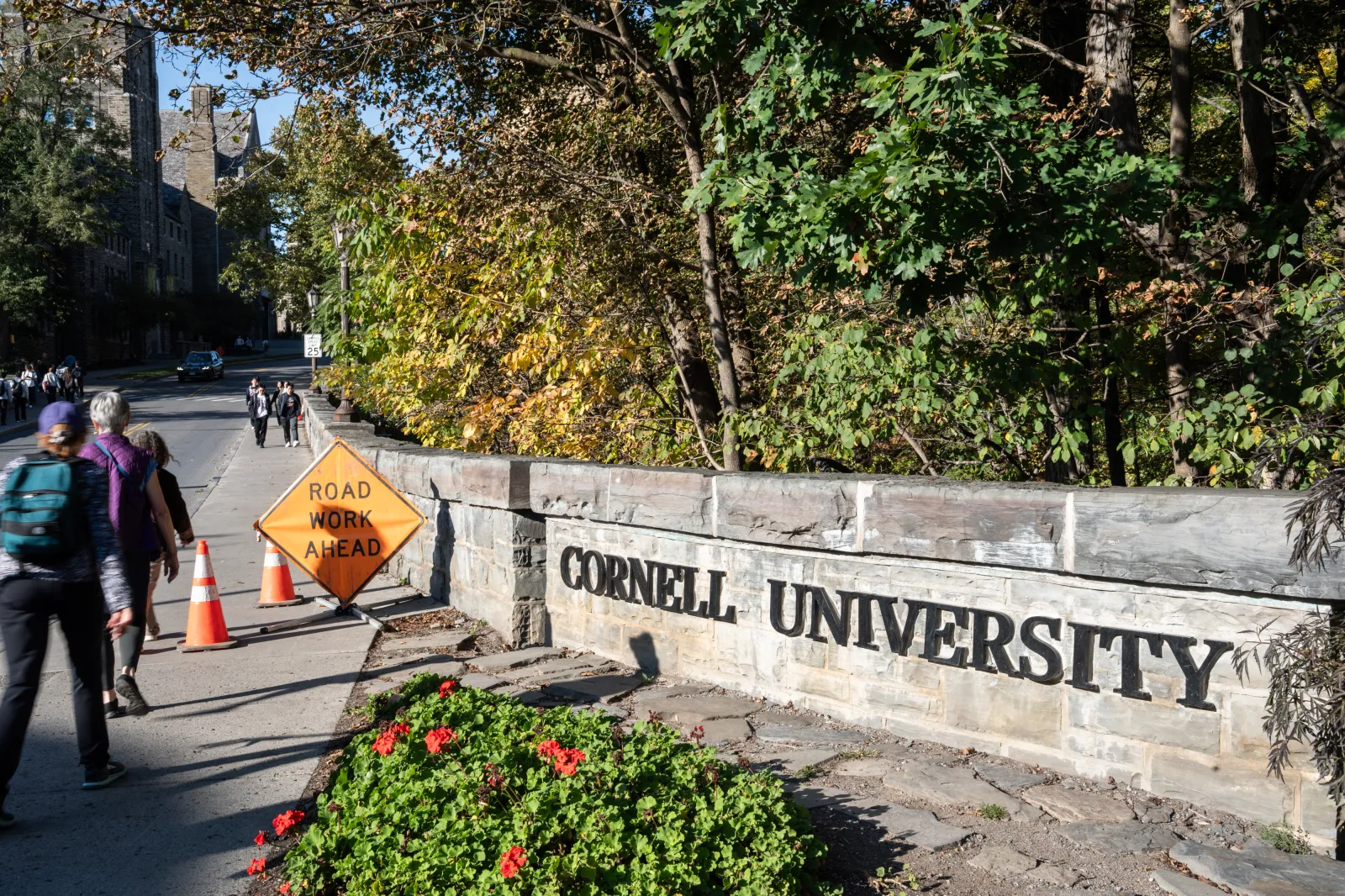 Students walk through Cornell University's campus on October 7, 2026, in Ithaca, New York.