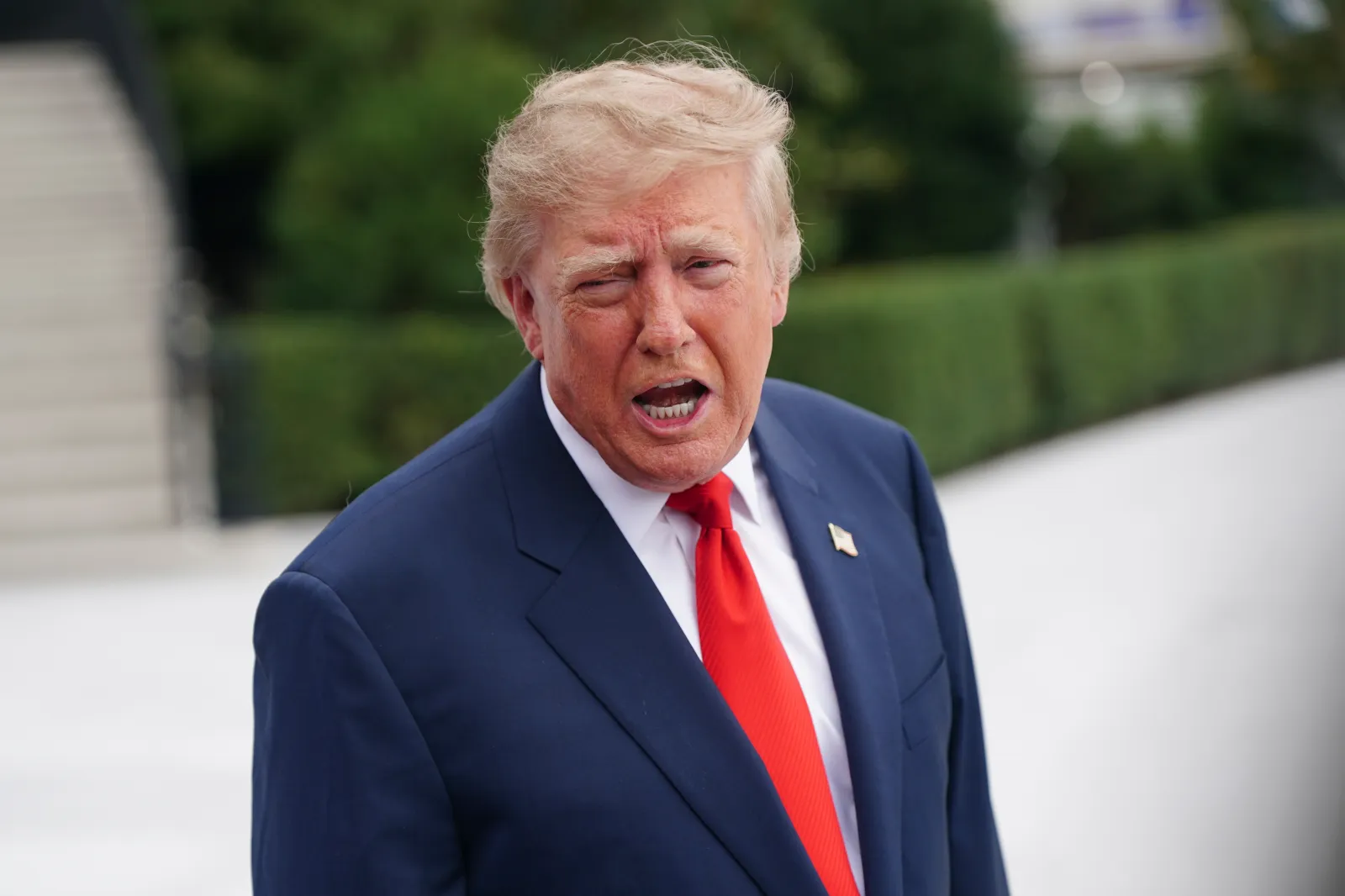 President Donald Trump speaks to members of the media before departing on Marine One from the South Lawn of the White House, Saturday, October 10, 2026, in Wash