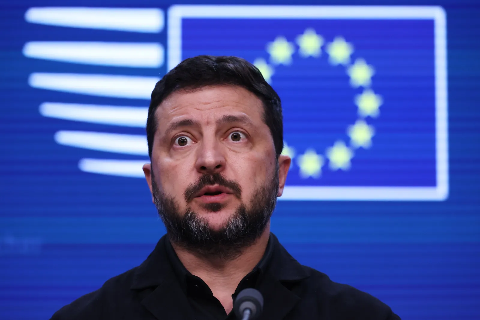 Ukrainian President Volodymyr Zelensky speaks during a media conference at the EU summit in Brussels on Friday.