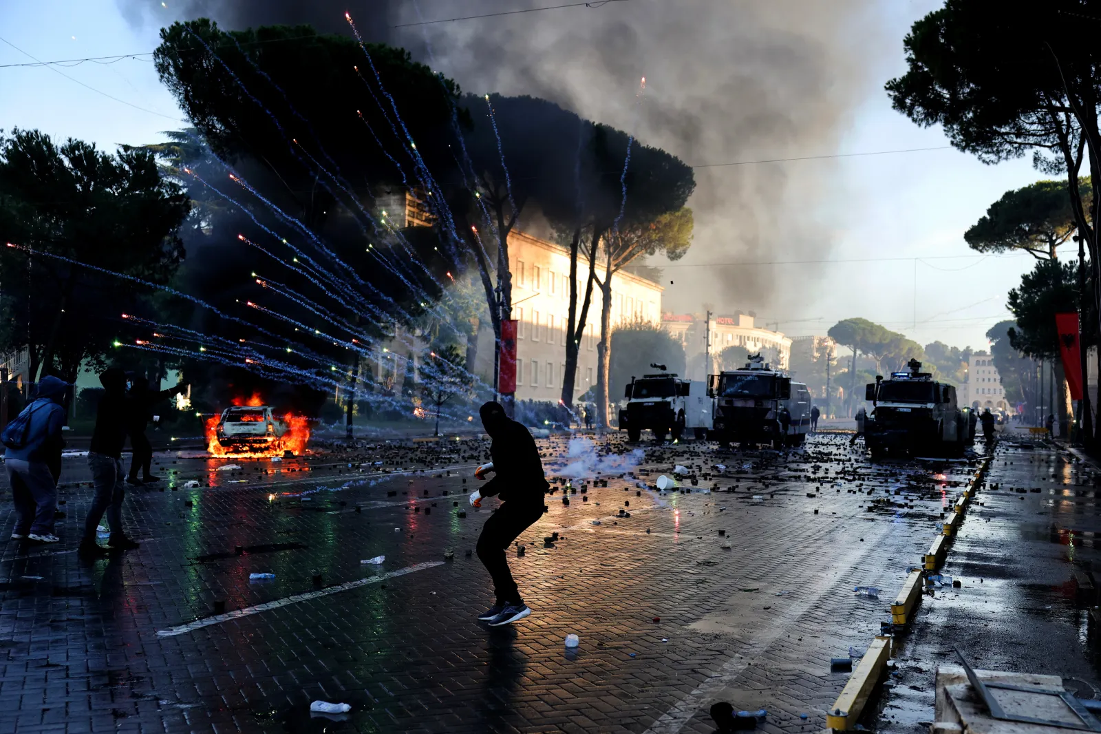 Protesters clash with the police during an anti-government demonstration outside the prime minister's office, in Tirana, Albania, on October 17.