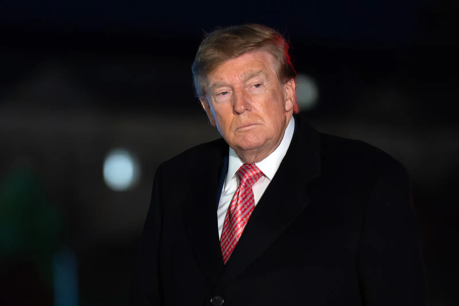 President Donald Trump walks on the South Lawn upon his arrival to the White House on October 18 in Washington.